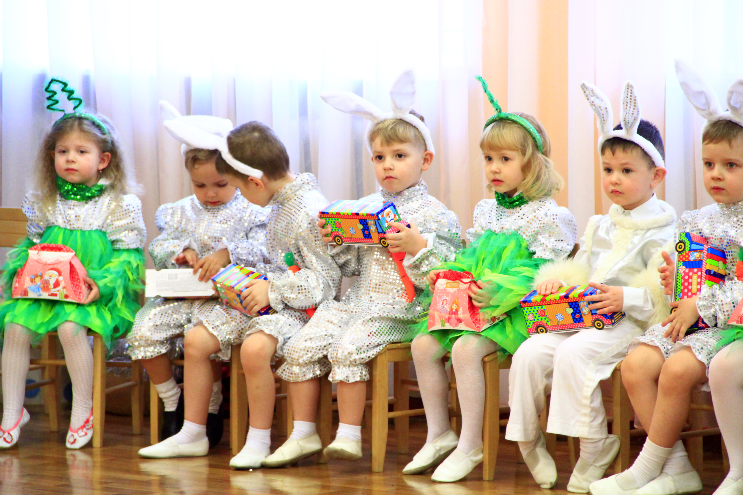 1 children-costumes-hares-sit-matinee-kindergarten-new-year-children-s-performance-fairy-show-with-children-children-holiday-suits-sit-chairs.jpg