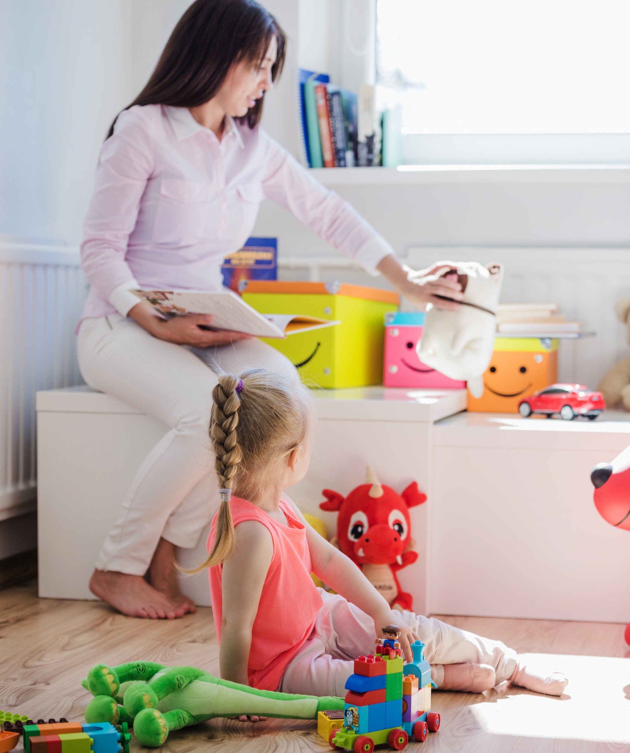 02 woman-playing-with-child-playroom.jpg 02 woman-playing-with-child-playroom.jpg