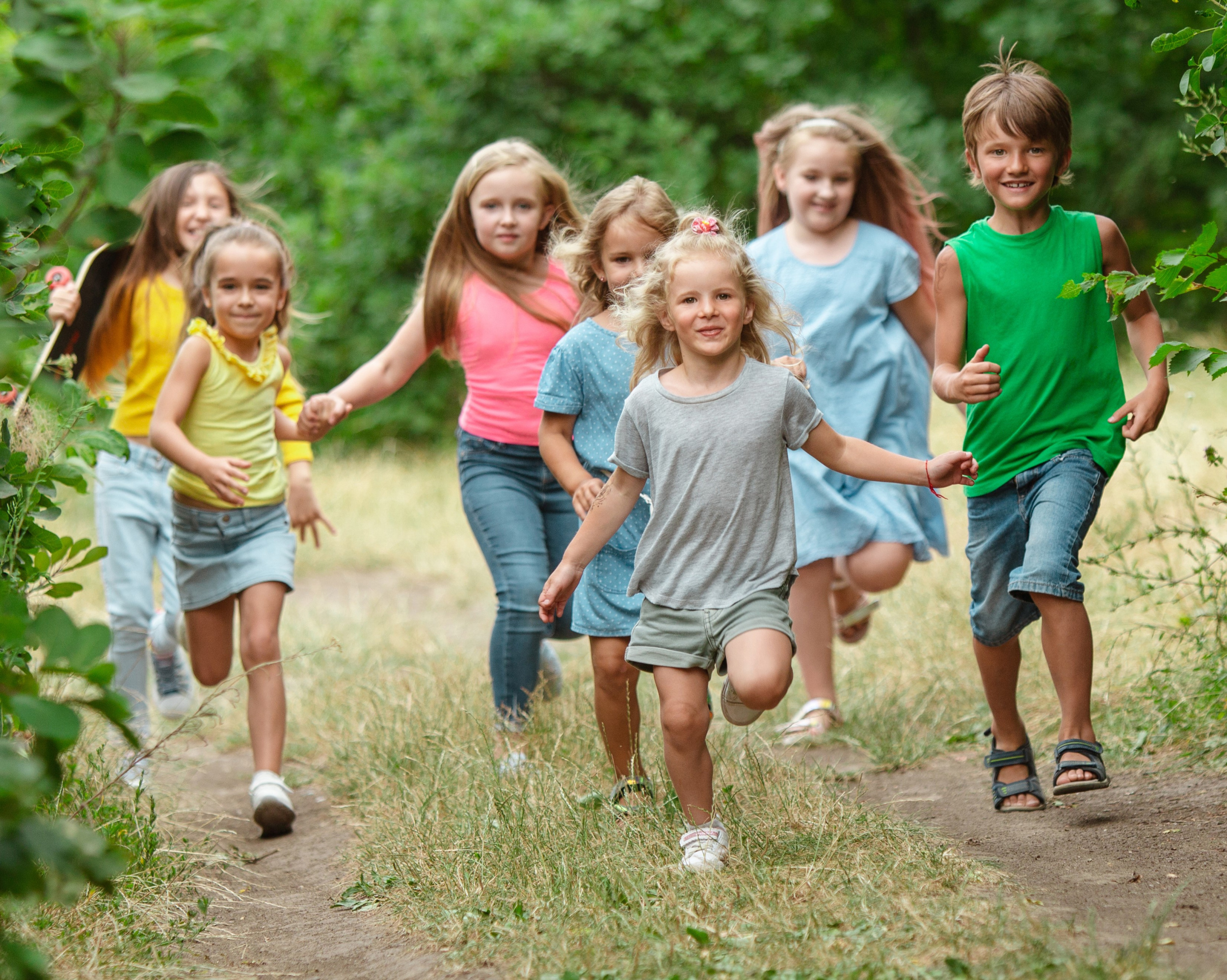 03 kids-children-running-green-meadow.jpg