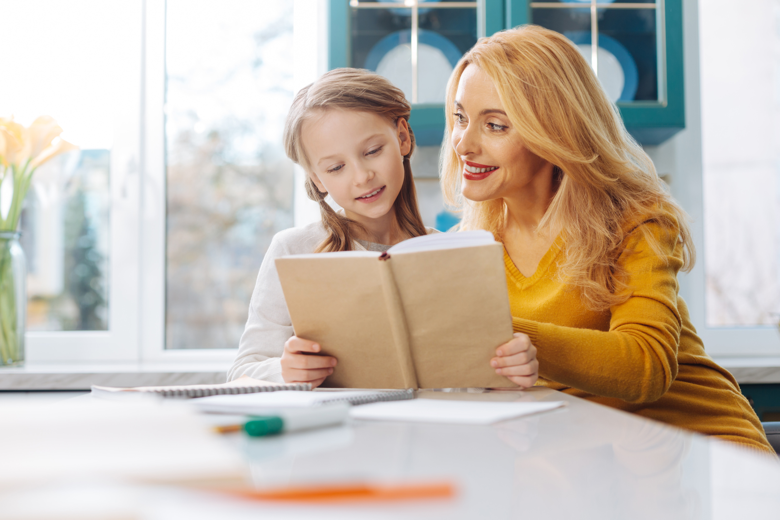 3 beautiful-happy-blond-slim-mother-looking-her-daughter-teaching-her-read-while-sitting-table.jpg 3 beautiful-happy-blond-slim-mother-looking-her-daughter-teaching-her-read-while-sitting-table.jpg