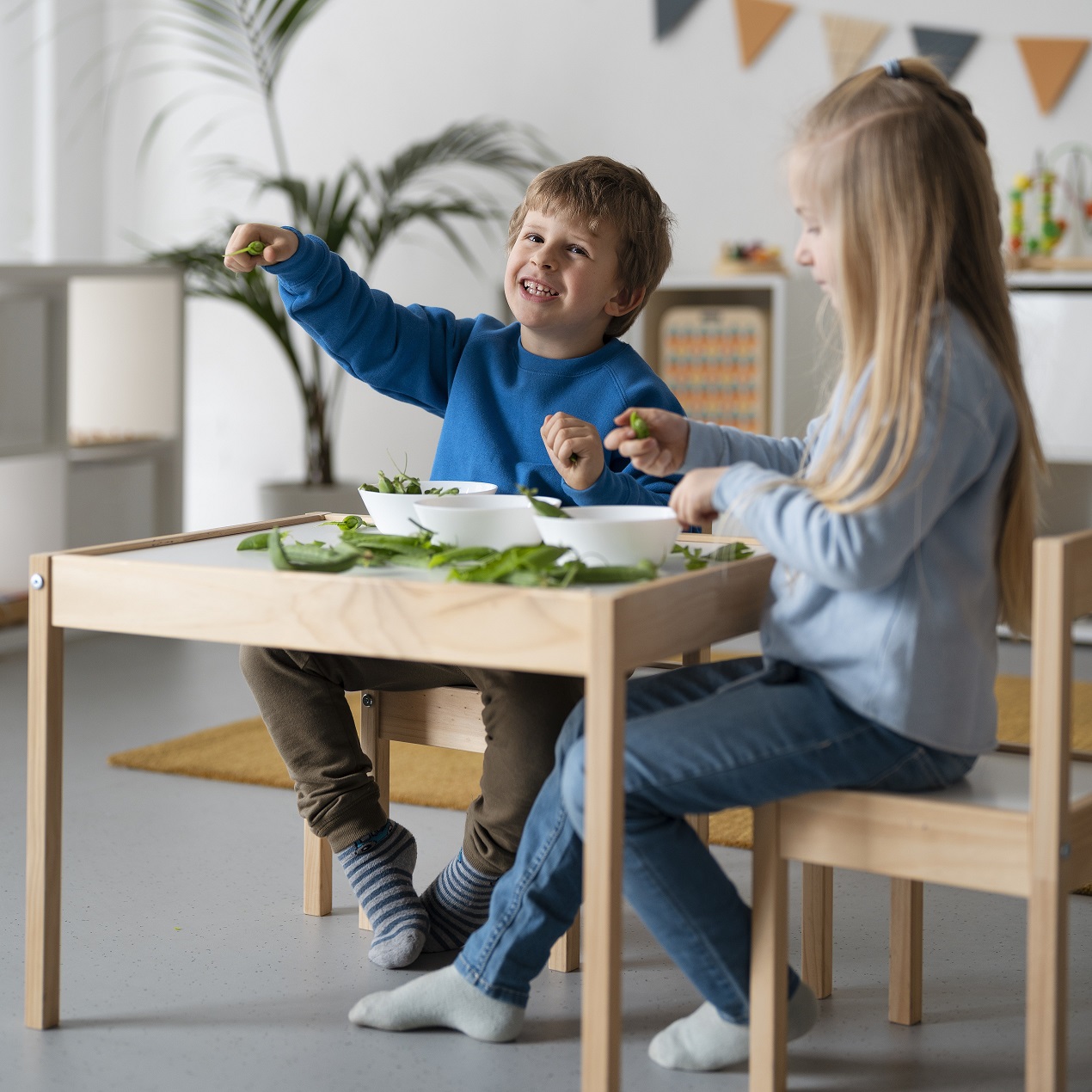 03 full-shot-kids-sitting-table.jpg