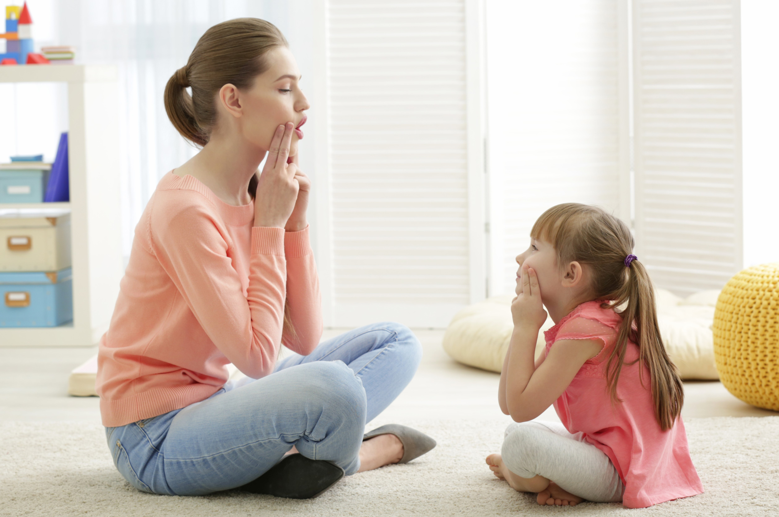4 cute-little-girl-speech-therapist-office.jpg